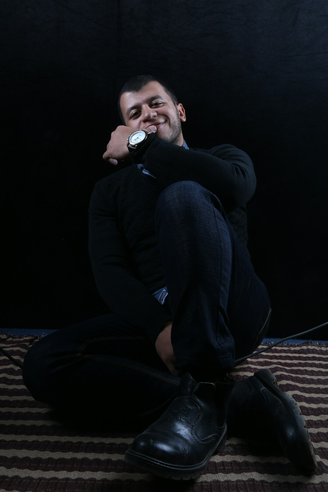 Studio portrait of a Latino man journalist in his 50s