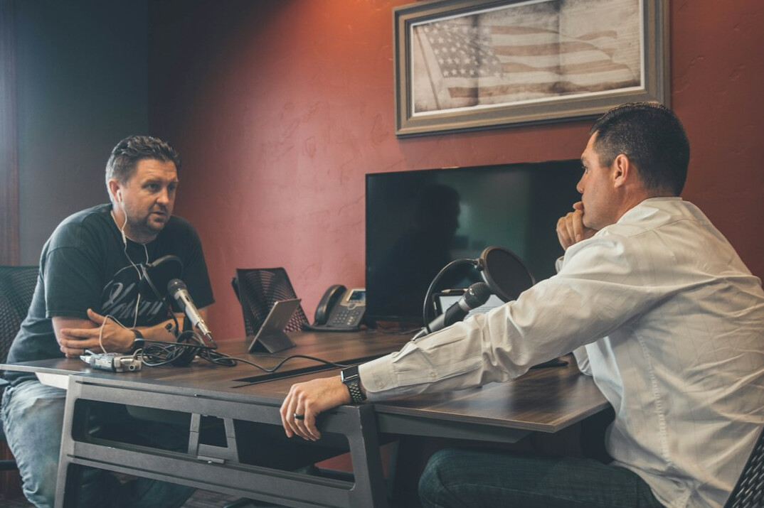 detective interviewing staff