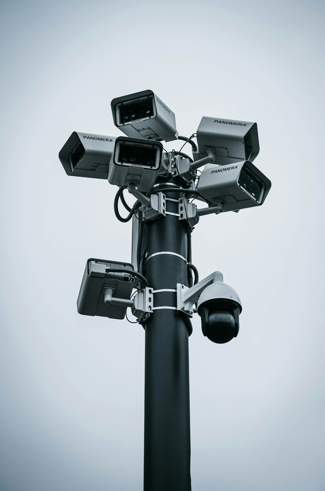 store security guard monitoring cameras