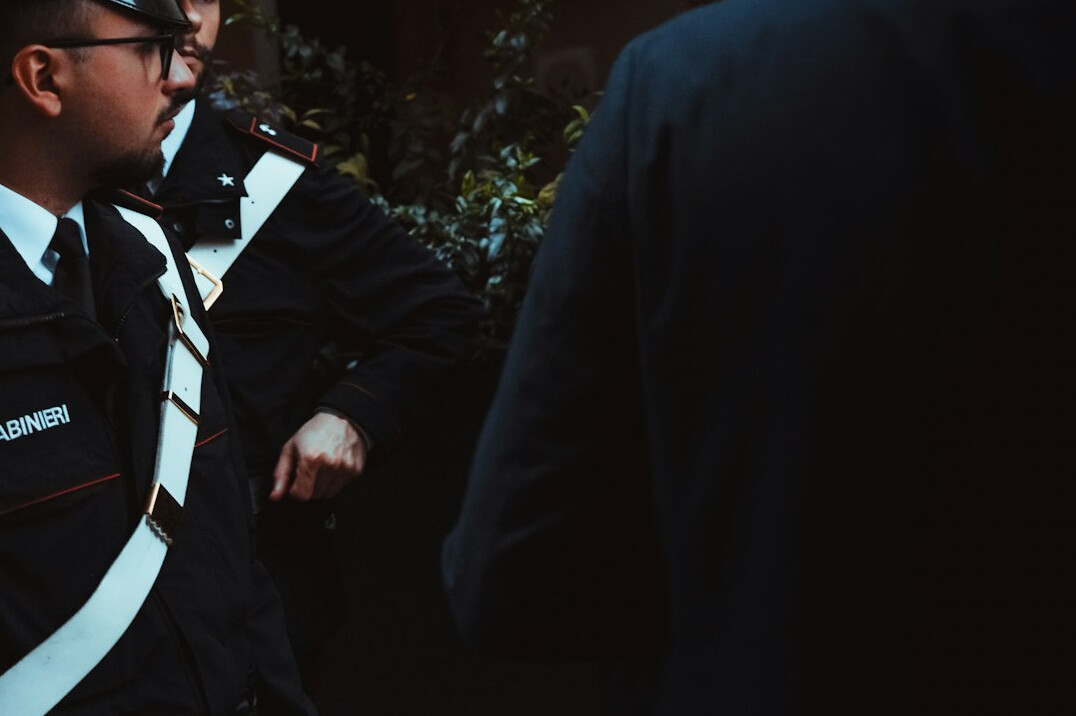 detective observing suspects
